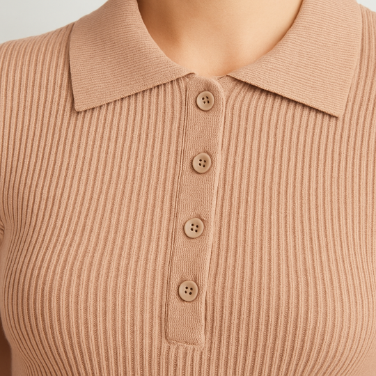 Beige short-sleeve ribbed knit polo top with button placket and pointed collar.